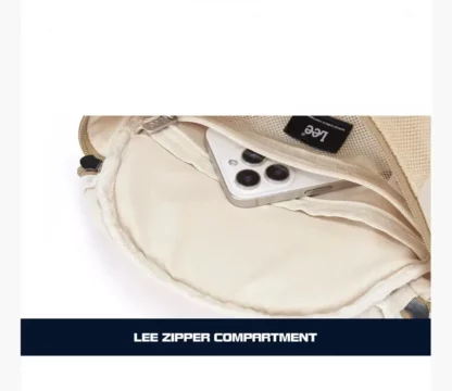 Inner zip pocket of the backpack holding a phone