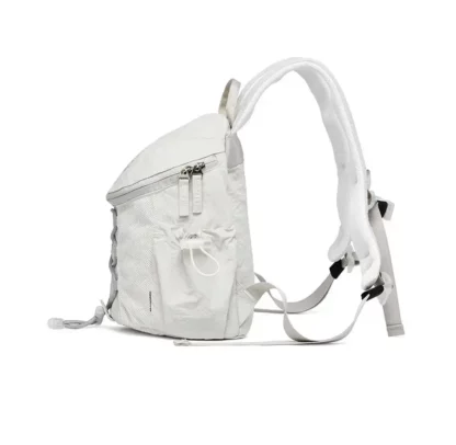 Off-white backpack seen from the side, with its straps