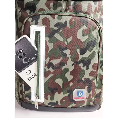Phone slipped into the front pocket of the camouflage cooler backpack