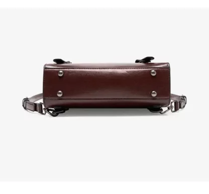 Base of the vintage split leather backpack with metal feet