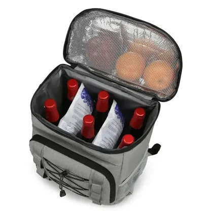 Open light grey backpack packed with bottles and snacks under a foil-lined lid