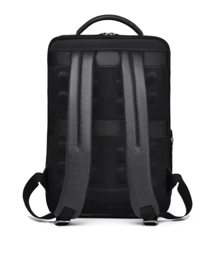 Back of the black faux leather laptop backpack, padded panel and luggage strap