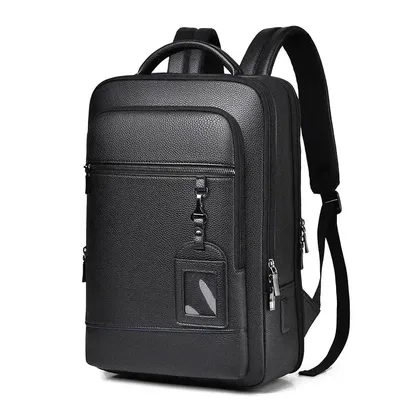 Black faux leather laptop backpack, angled front view with an ID tag