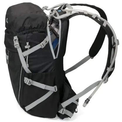 Side view of the black backpack with its straps and hip belt