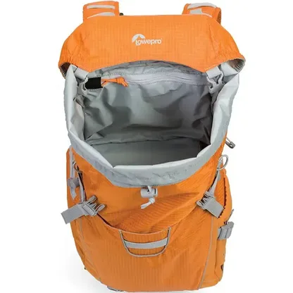 Orange backpack with its top opened, showing the gray lined main compartment