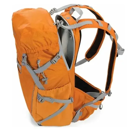 Side view of the orange backpack with its straps and side pocket